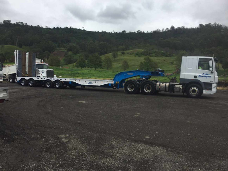Truck and low loader float